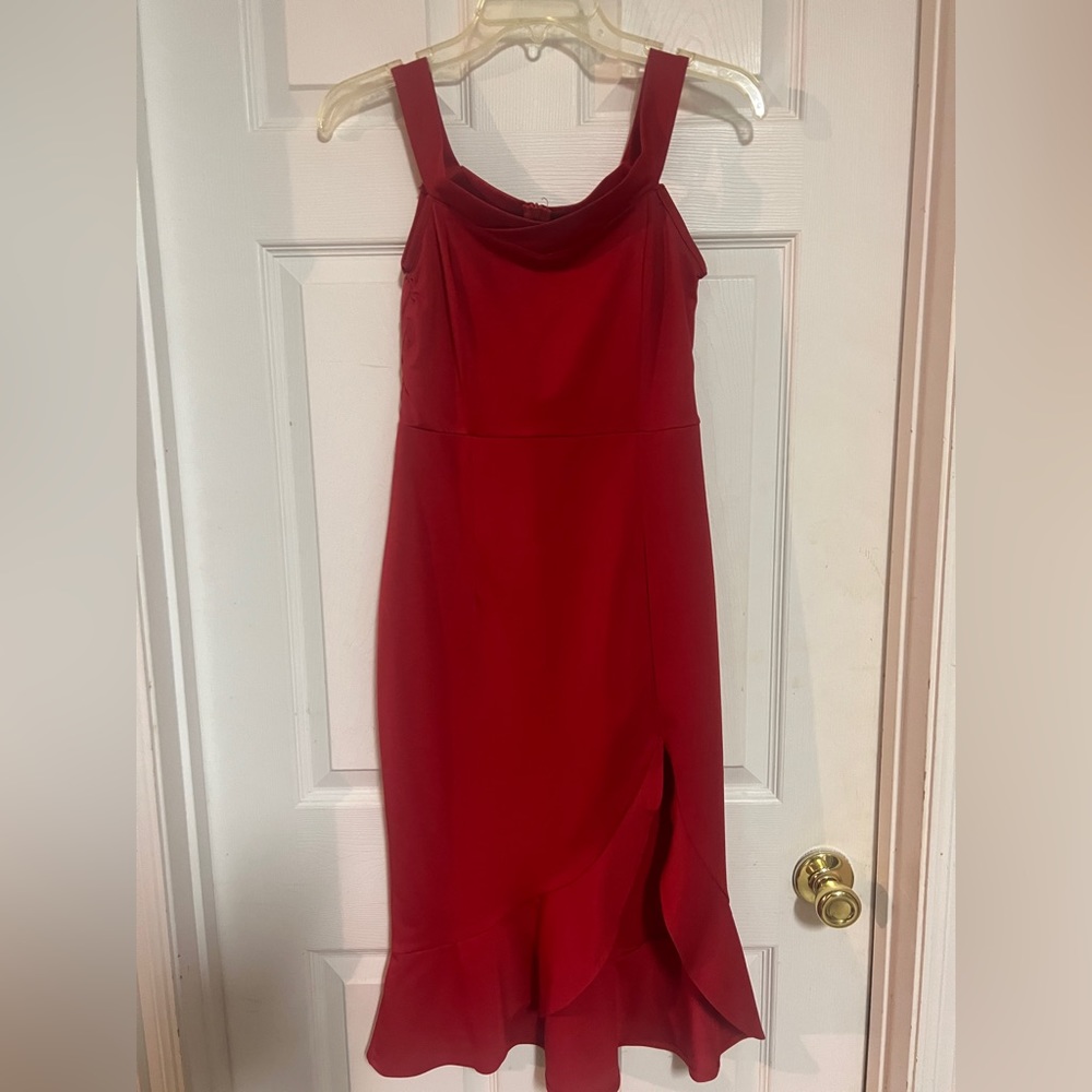 Red sleeveless cocktail dress, ruffled hem with split